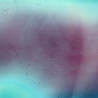 Hazy blue and pink image with a faint outline of an unknown figure.