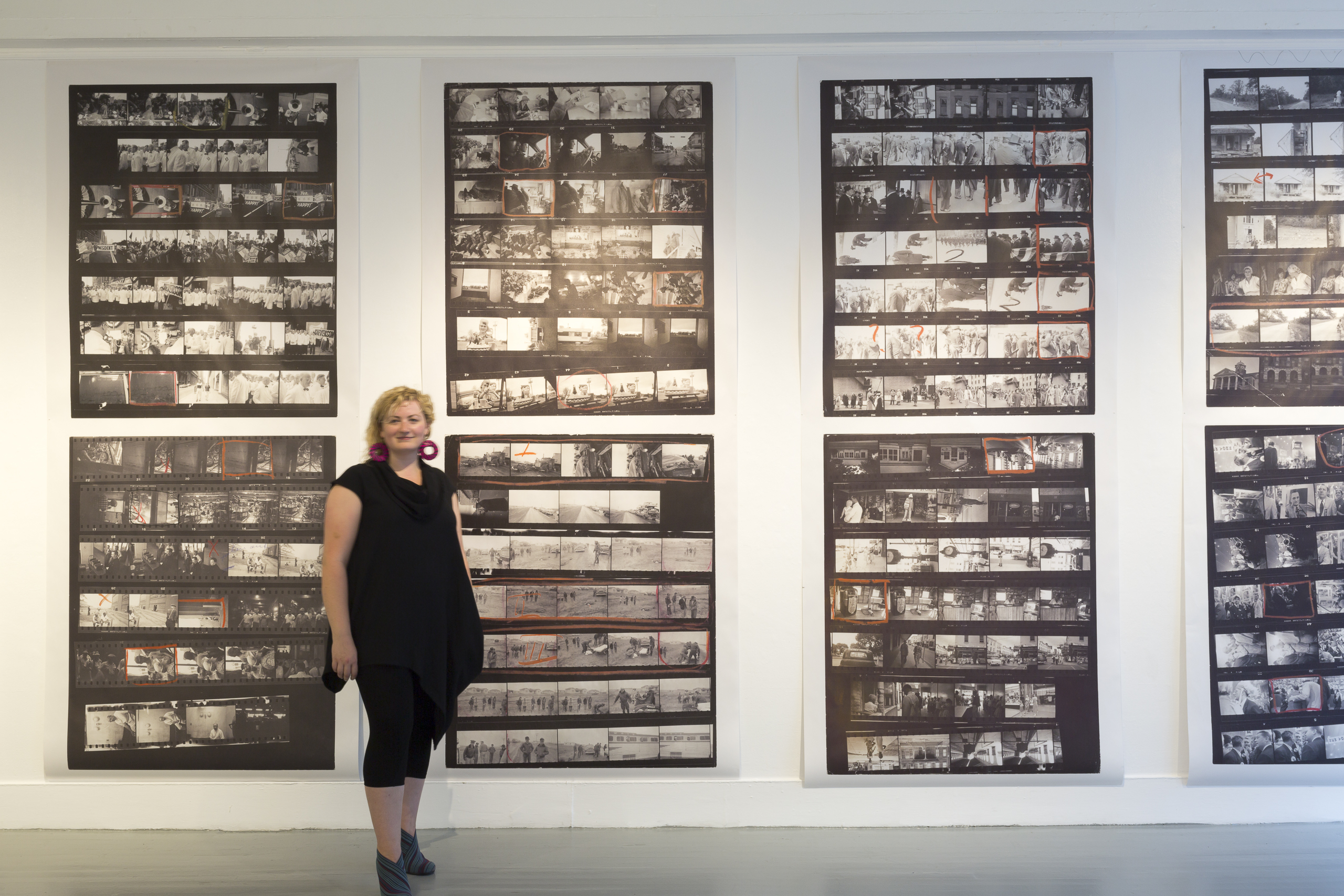 Melanie with prints by Robert Frank