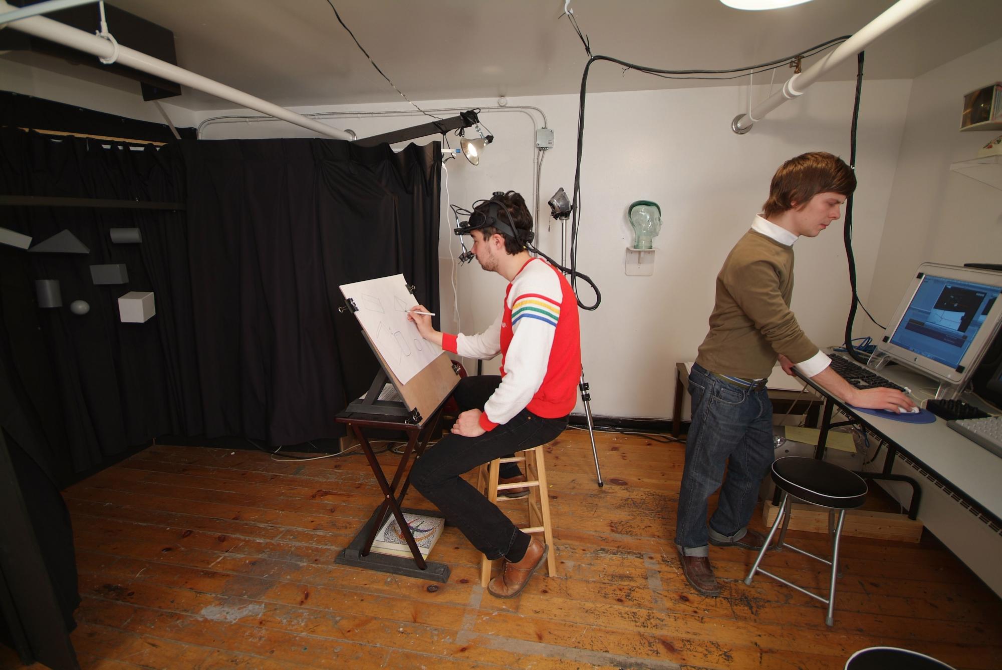 Using eye tracking hardware, a NSCAD researcher conducts an experiment as part of the Drawing Lab's first Longitudinal study of how post-secondary students learn to draw from observation.
