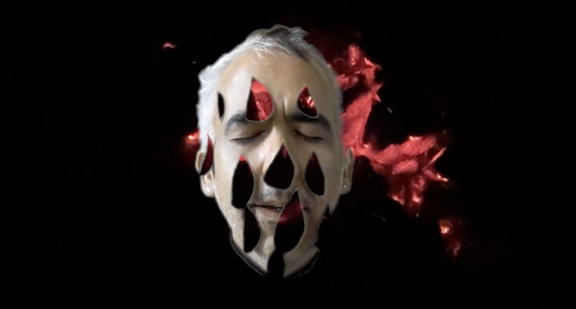 Peter's face appears floating on a black screen, his eyes are closed, and there are teardrop shaped cut outs on his skin that show the black and flaming background behind him