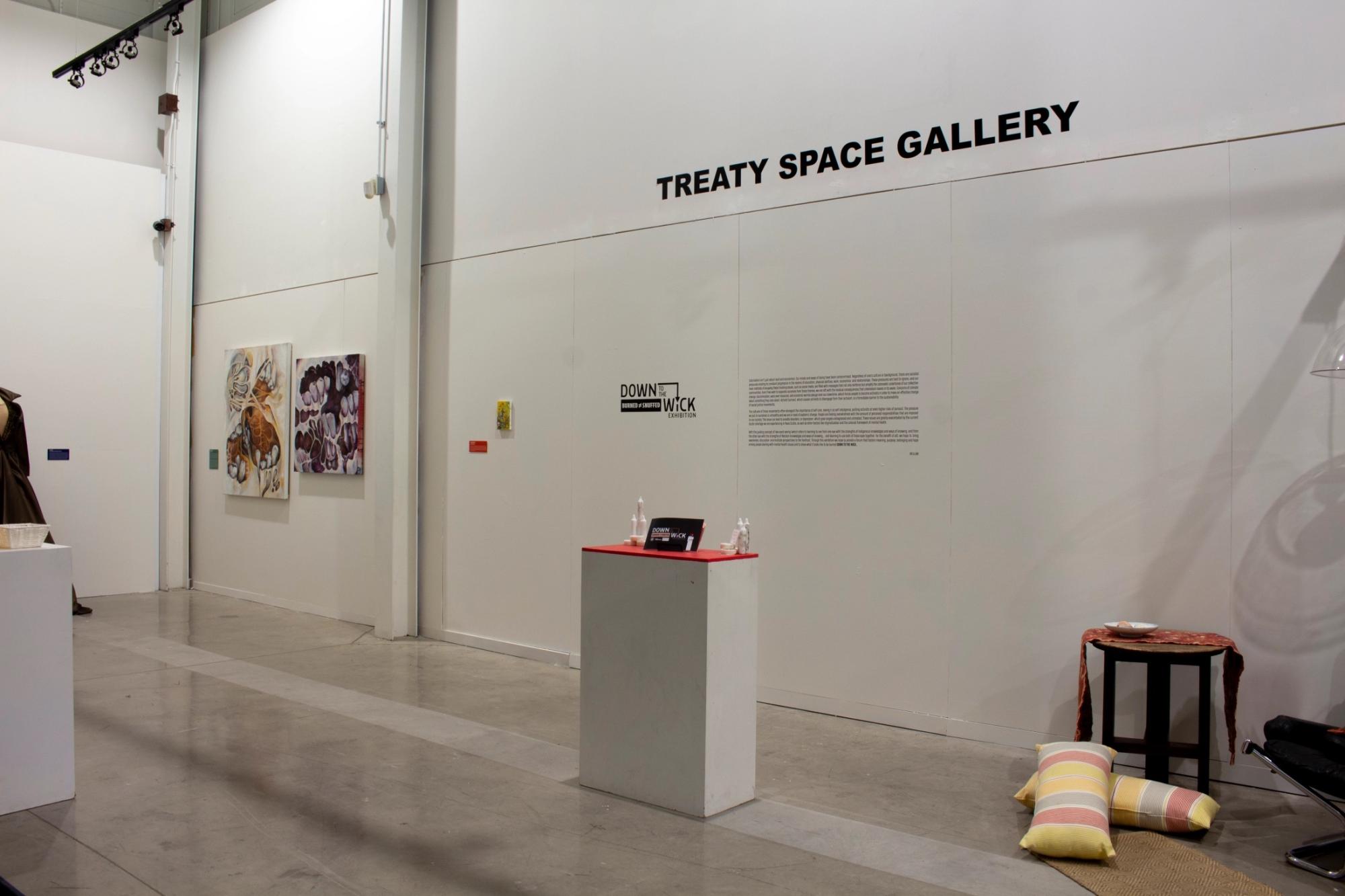 plinth and wall mounted artwork in Treaty Space Gallery