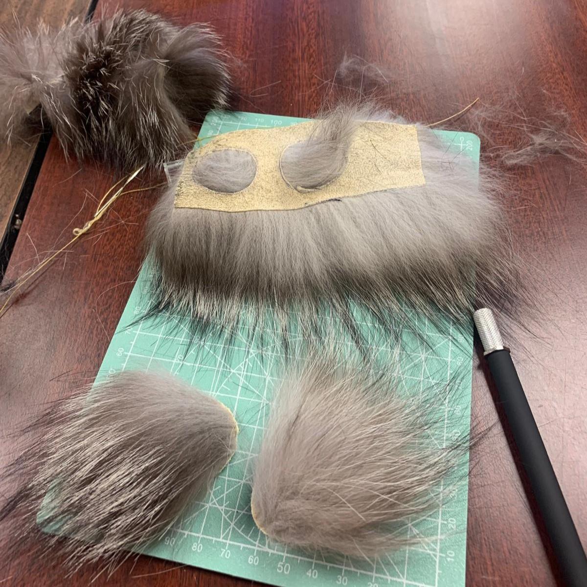 Circle cutouts of fox fur for making earrings 