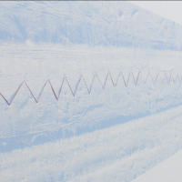 closeup of Maureen's print of her work with a white snowy background landscape with red zig zag across it