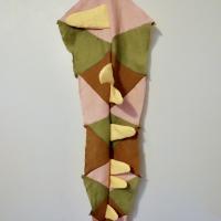 Multi-colored fabric sewn together that resemble the Jipijka’m (Chi-PEECH-calm), the Great Horned Serpent of Mi’kmaq culture.